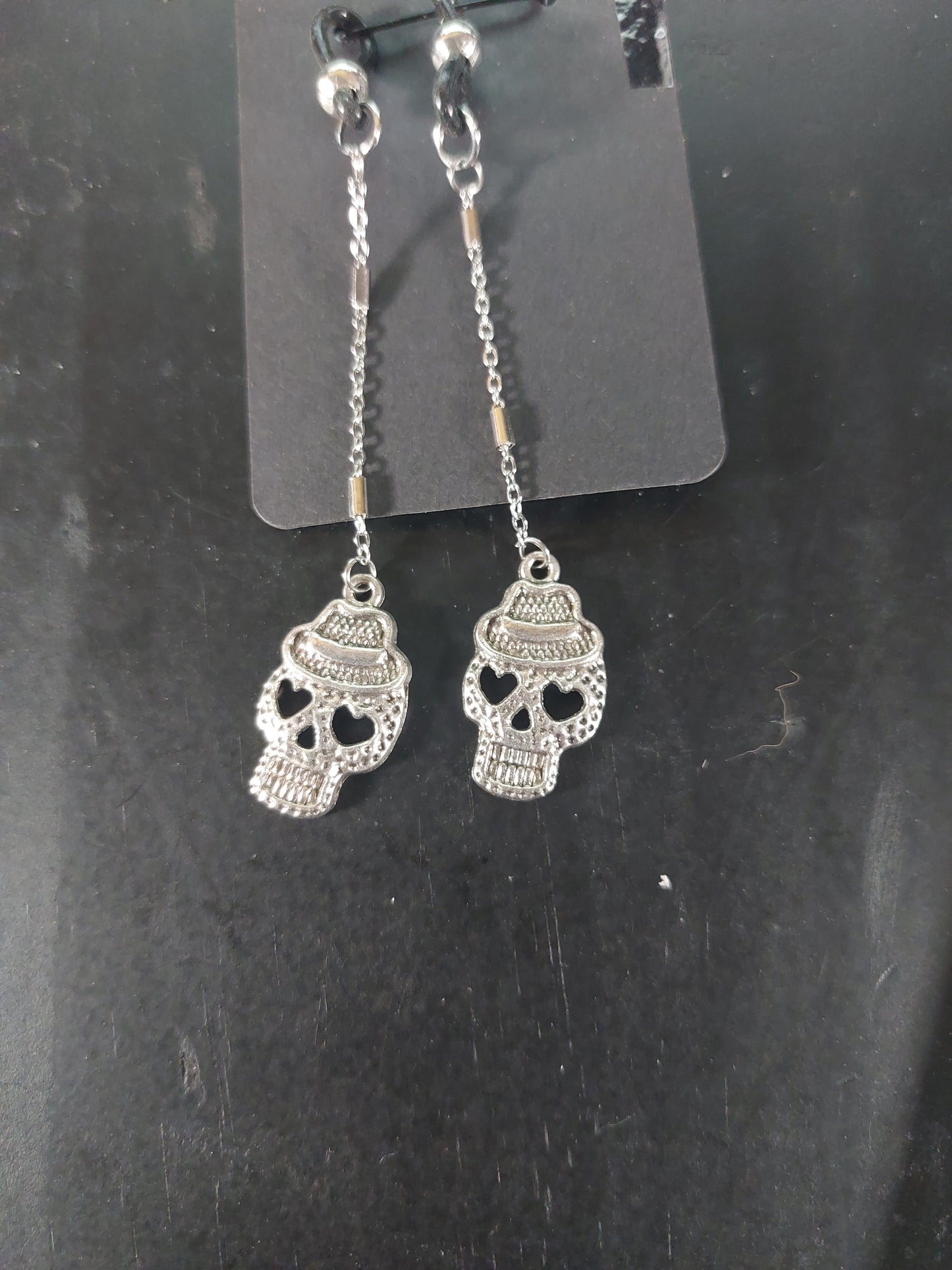 Silver Tone Eye Glass Charm with Skulls