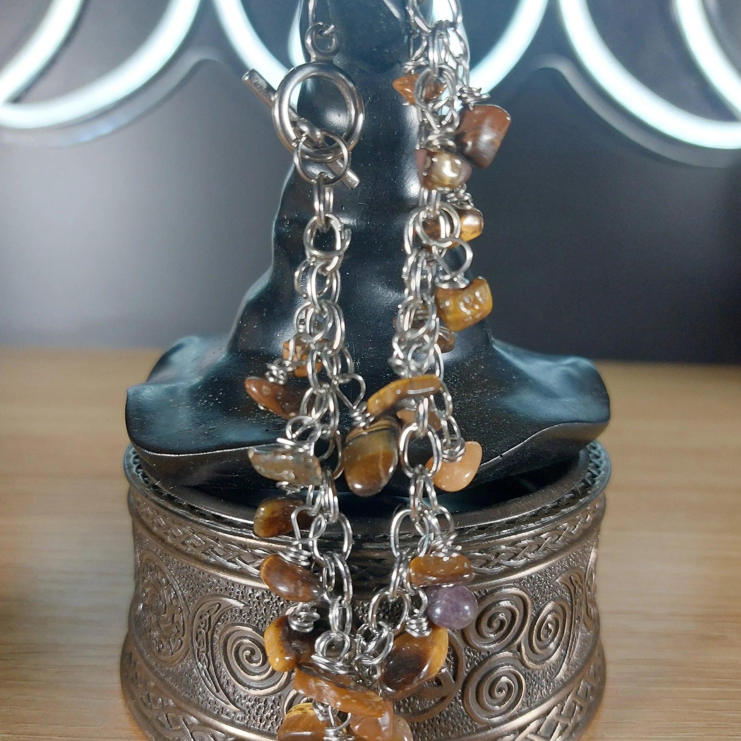 Tigers Eye chip bracelet, approximately 8in, with stainless steel chain and natural brown-gold stones.