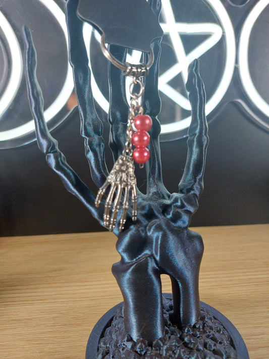Silver Tone Large Skeleton Hand with Glass Beads Keychain