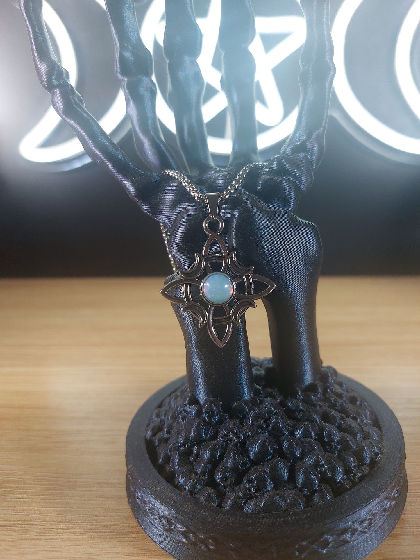 Silver Tone Witches Knot with Opal Like Stone