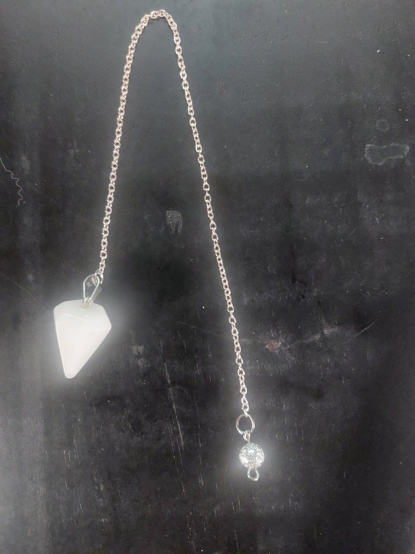 Clear Quartz Pendulum on a Silver Tone Cain