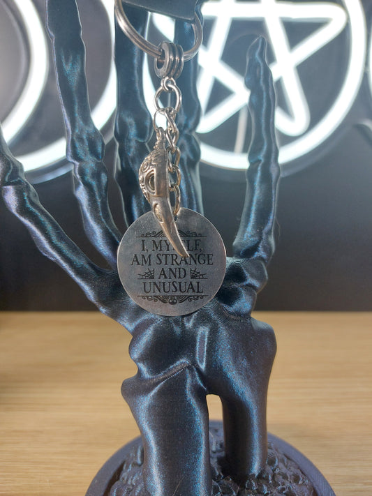 I Myself Am Strange and Unusual Medal with Charm Keychain