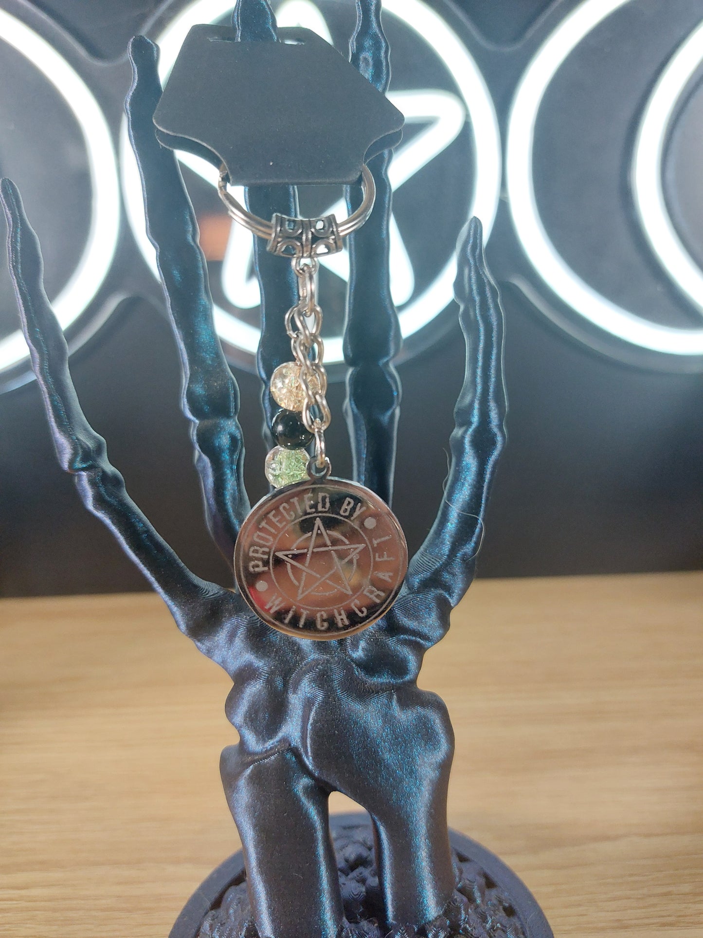 Silver Tone PROTECTED BY WITCHCRAFT  Medal with Glass Beads Keychain